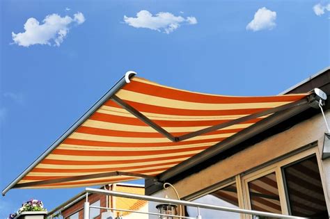 retractable awning cost  complete buying guide rollac