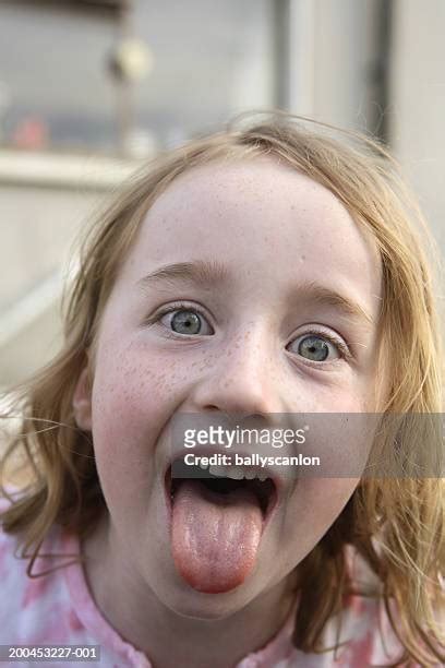 Girl Mouth Open Tongue Out Bildbanksfoton Och Bilder Getty Images