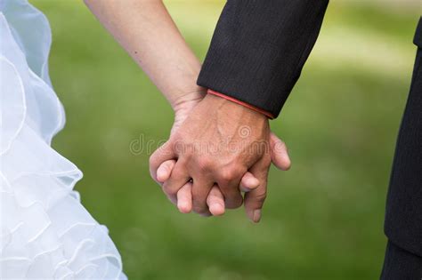 Married Couple Holding Hands Ceremony Wedding Day Stock