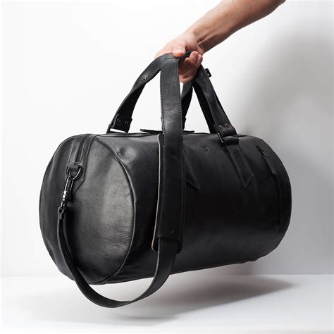 substantial duffle bag black  liters capra leather touch  modern