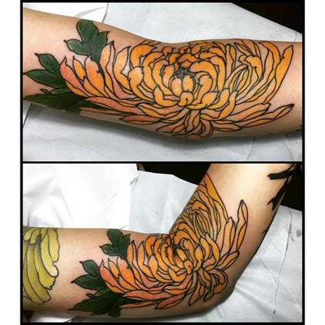 Japanese Style Chrysanthemum Tattoo On The Left Arm