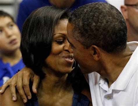 President Obama And Michelle Share A Smooch On Kiss Cam