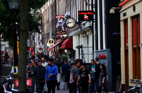 Amsterdam’s Famous Red Light District Back In Business After Lockdown