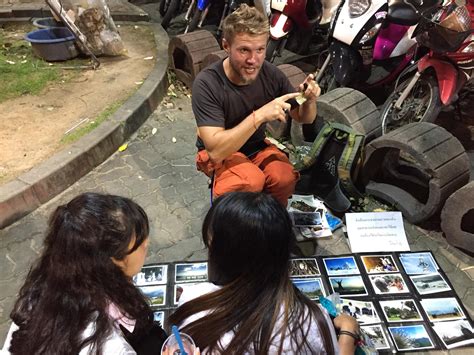 ‘cute begpacker selling pics of himself for flight home gets love from thai women video