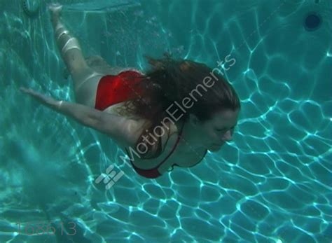sexy bikini clad blonde underwater 4 stock video footage
