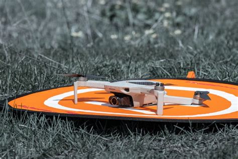 dji mavic mini  drone  orange landing mat pad editorial stock photo image  flycam