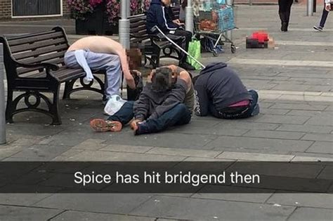 shocking picture shows spice zombies slumped on pavement in town
