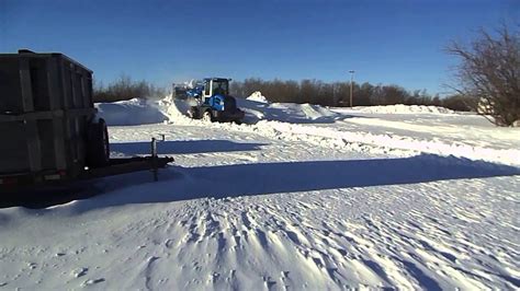 wheel loader  ton working  snow  youtube