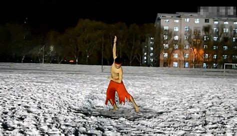 man dances half naked in sub zero harbin snow to woo