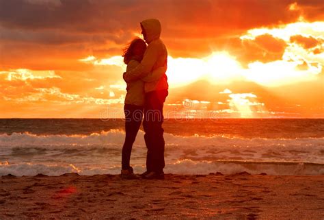 Couple Man And Woman Hugging In Love Staying On Beach