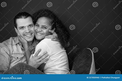 Portrait Of Happy Interracial Couple Having Good Time Together At Home