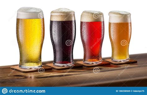 Collection Of Four Types Of Different Beer In Glasses Isolated On A