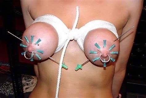 needles in breasts and nipples torture photos