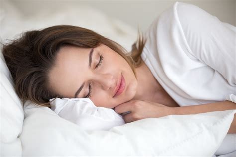 young woman sleeping  lying asleep  comfortable cozy bed