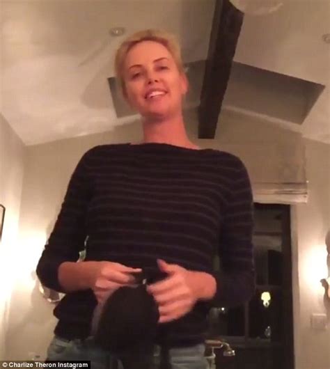 charlize theron tosses bra for international women s day daily mail