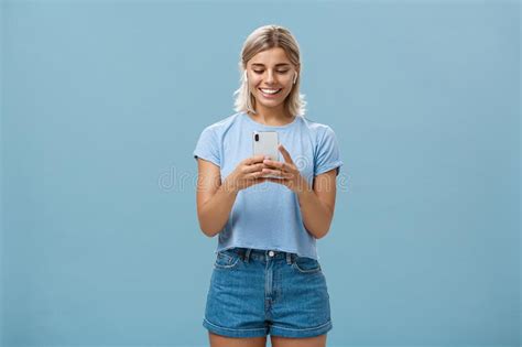 girl having funny convesation speaking with friend via video messages