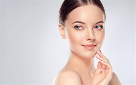 beautiful young woman  clean fresh skin touch  face facial