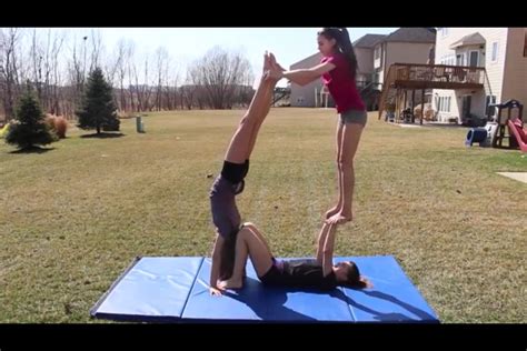 person acro stunt acro yoga poses acro yoga  person yoga poses
