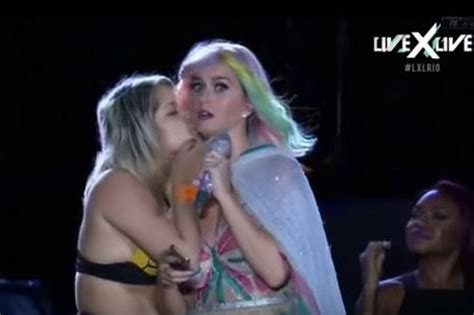 katy perry showered with kisses during awkward encounter with fan