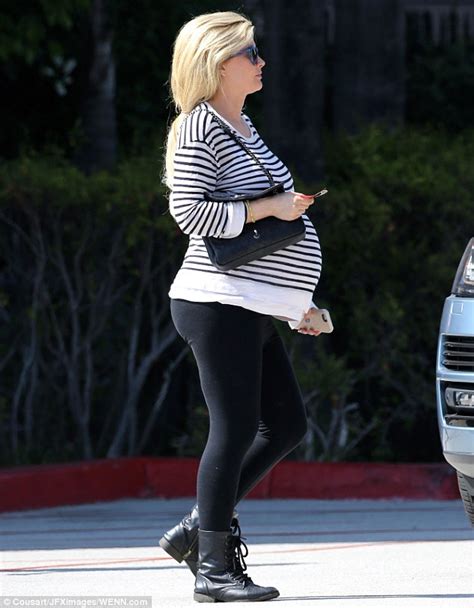 pregnant holly madison steps out looking fit to burst daily mail online
