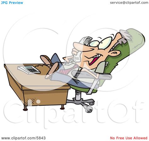 Lazy Business Man With His Feet On A Desk Talking On A