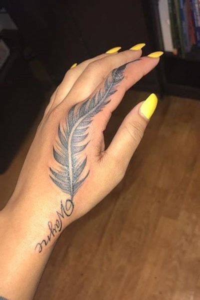 25 awesome hand tattoo designs for 2021 the trend spotter