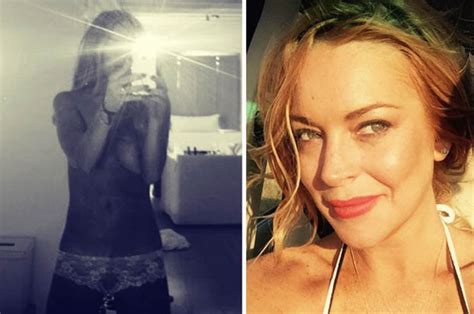 lindsay lohan snaps topless selfie while wearing lace undies in hotel