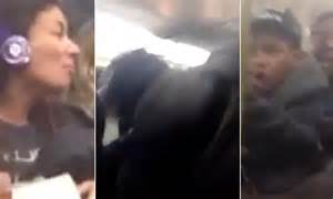 black teen punches woman after she calls him smelly nigerian in shocking racist video filmed