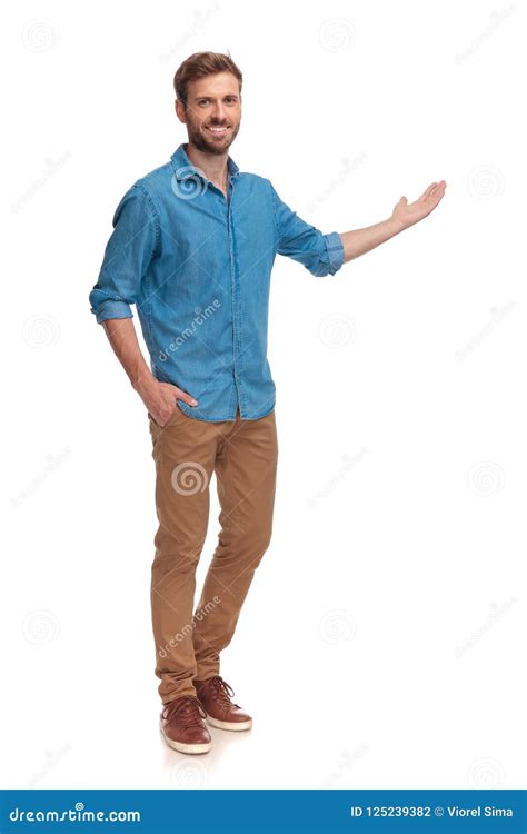 full body picture   young casual man presenting stock photo image  gesture