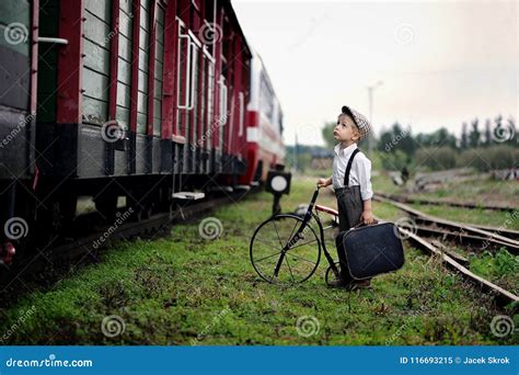 years  sad boy waiting   train stock image image  lost outdoors