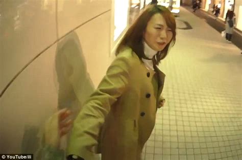 kisses in tokyo ili ad shows man chasing women in the street for a kiss daily mail online