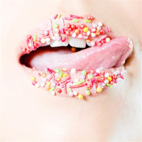 Closeup On Female Sweet Candy Lips With Licking Tongue