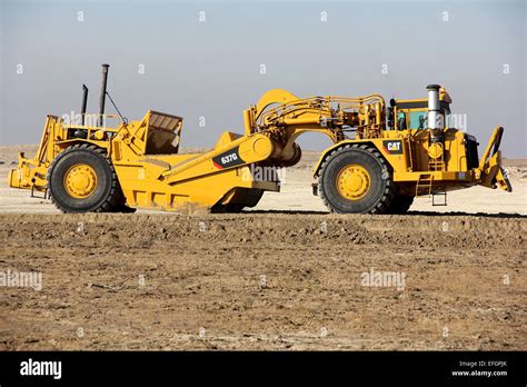 cat  wheel tractor scraper  iraq stock photo alamy