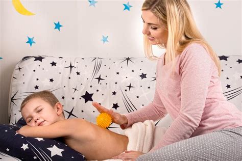 mother   massage       son stock image image  care