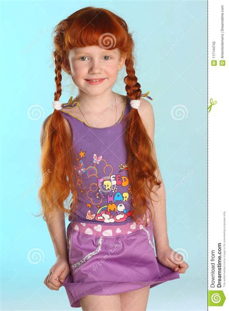 portrait of little redhead pre teen fashion girl model in