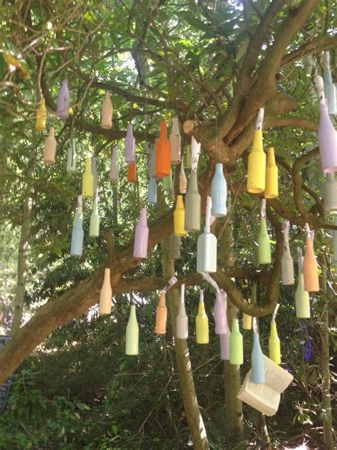 Colored Bottles Hanging From Trees I Wonder If I Hang
