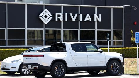 rivian holding  hands meeting friday  address company