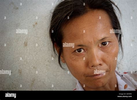Close Up Portrait Of A Vietnamese Serious Looking Woman Mother Of A