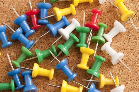 stock photo  colorful sharp pins  top  cork board freeimageslive