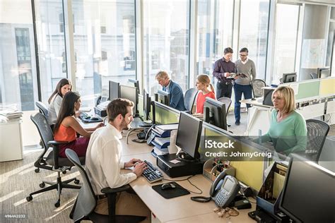 office workers  desks  computers  modern office stock photo