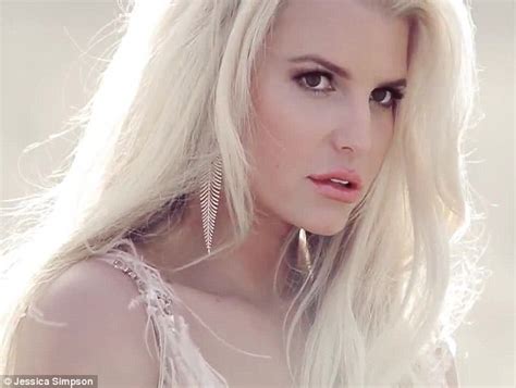 jessica simpson displays her cleavage in plunging dress
