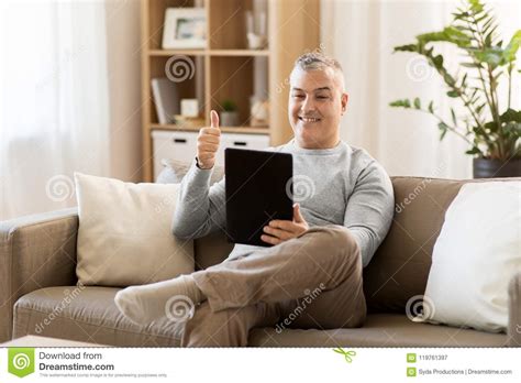 Man Having Video Chat On Tablet Pc At Home Stock Image Image Of