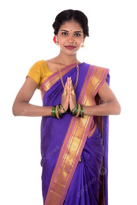 indian girl in traditional sari greeting with namaste posing sari