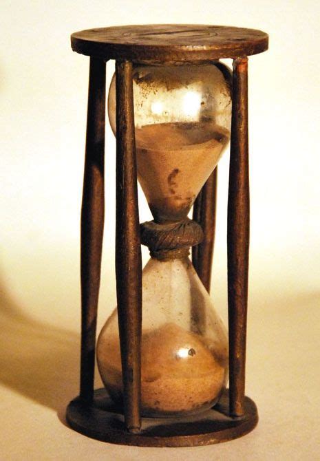 a late 18th century country made hourglass approx 30 minute duration