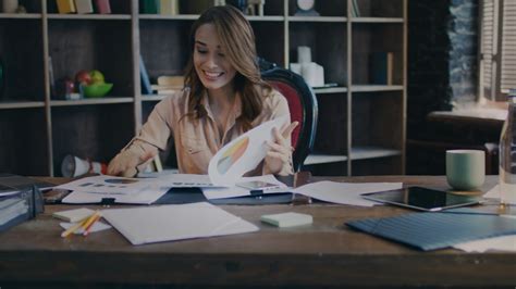 successful business woman reading data stock footage sbv 322345556