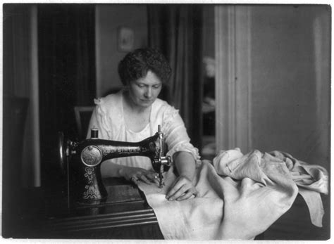 filewoman sewing   singer sewing machinepng wikimedia commons