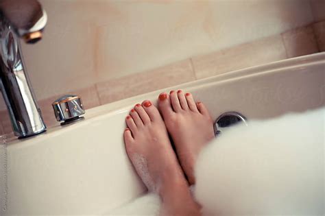 Woman S Feet In The Bubble Bath By Carolyn Lagattuta Stocksy United