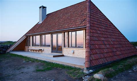 beautifully renovated norwegian cottage combines      pitched roof inhabitat