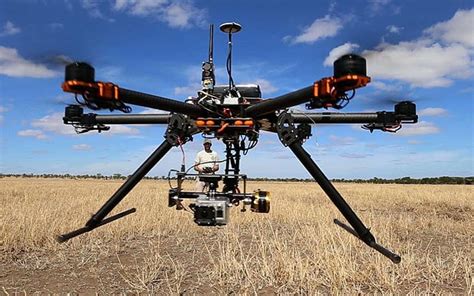 video drone camera films serengeti vistas  wildlife close  telegraph