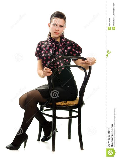 Beautiful Woman In Retro Style Sitting On A Chair Stock